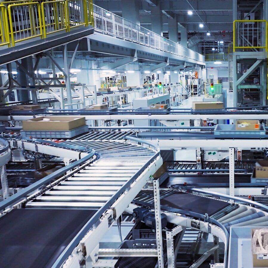 a factory filled with lots of machines and boxes