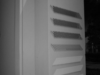 white wooden door with black metal door lever